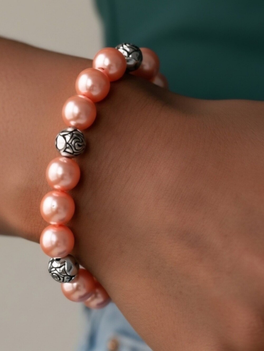 Rosy Radiance Orange And Silver Beaded Stretch Bracelet
